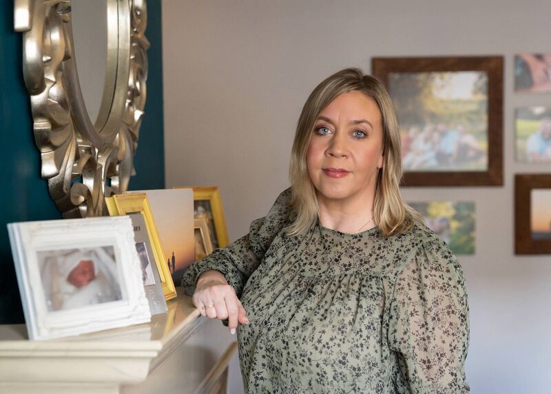 Volunteer photographer Michelle McCormack beside a photo a nurse took of her daughter Caoimhe before NILMDTS Ireland was established. Picture: Michelle McCormack/NILMDTS Ireland.
