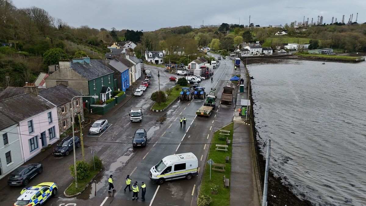 Tractors blocking the main road of the village at Whitegate. Picture: Larry Cummins Tractors blocking the main road of the village at Whitegate. Picture: Larry Cummins