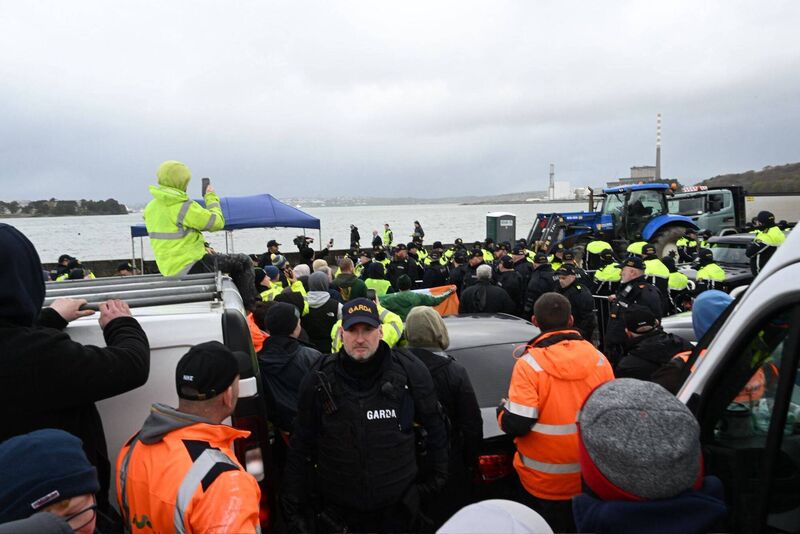 Tense scenes between gardaí and fuel price protesters at Cork's Whitegate oil refinery on Saturday, April 11. Picture: Larry Cummins