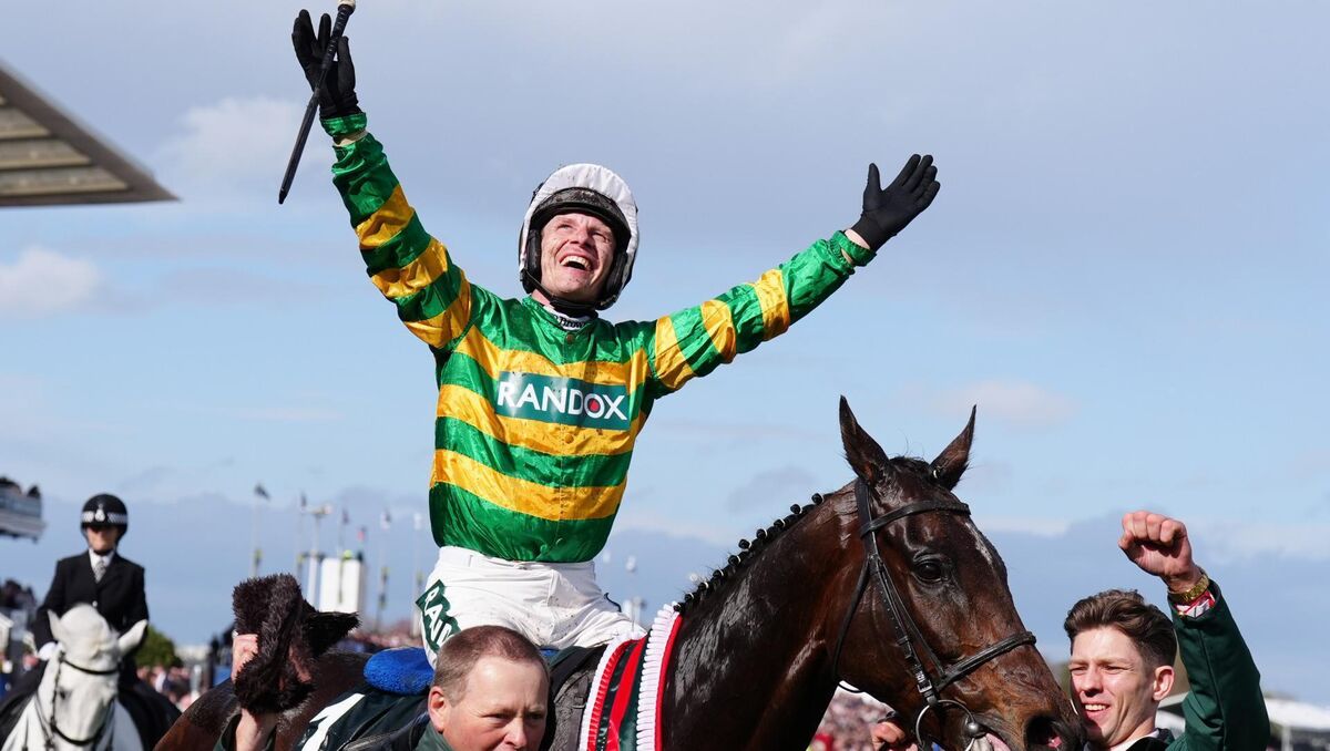 Paul Townend celebrating after I Am Maximus won the Grand National for the second year in a row at Aintree. Pic: Owen Humphreys/PA