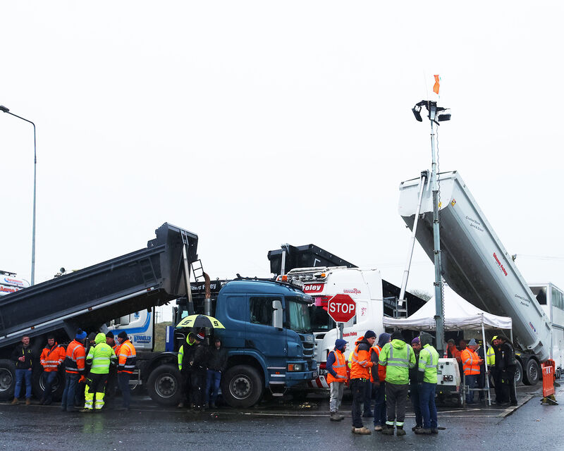 Protesters take part in a blockade at a fuel depot in Foynes, Co Limerick.