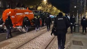 <p>Gardaí remove fuel protesters from O'Connell St in the early hours of Sunday morning. </p>