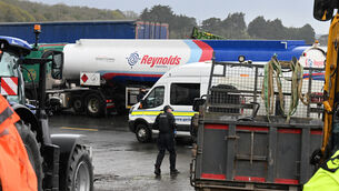 <p> Fuel trucks heading to the oil refinery under garda escort at Whitegate village on Saturday. Picture: Larry Cummins</p> <p> Fuel trucks heading to the oil refinery under garda escort at Whitegate village on Saturday. Picture: Larry Cummins</p>
