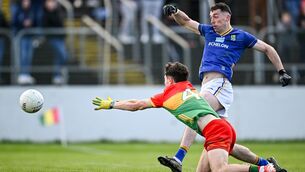 <p>KICK-LOW: Padraig O’Toole scores his side's first goal during the Leinster GAA Football Senior Championship Round 1 match between Carlow and Wicklow. Pic: Seb Daly/Sportsfile</p>