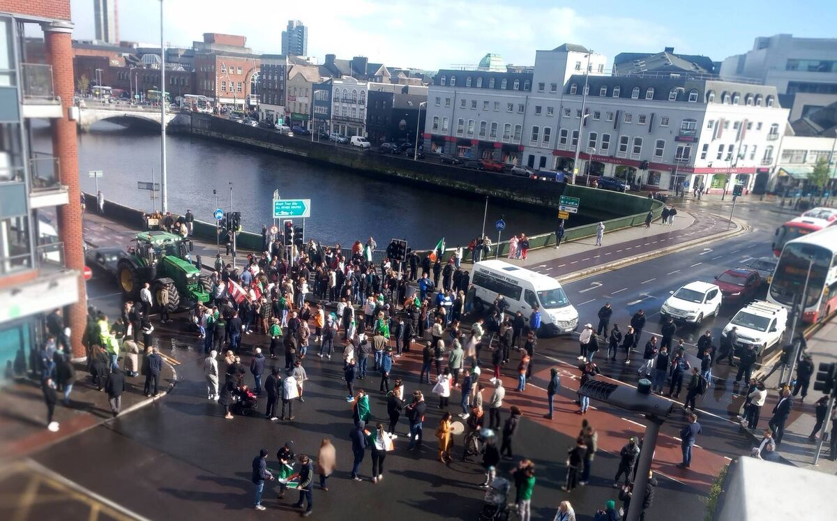 Traffic was held up briefly around 5pm on Sunday when people stood at the junction between Camden Quay, the N20, and Christy Ring Bridge in Cork city centre. Reader picture Traffic was held up briefly around 5pm on Sunday when people stood at the junction between Camden Quay, the N20, and Christy Ring Bridge in Cork city centre. Reader picture