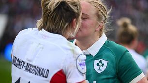 <p>Cliodhna Moloney-MacDonald of Ireland and Claudia Moloney-MacDonald of England kiss after the Women's Six Nations Rugby Championship match. Pic Shauna Clinton/Sportsfile</p>