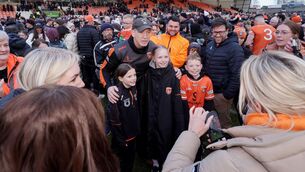 <p>WIN'S A WIN: Armagh Manager Kieran McGeeney poses for photos with fans after the game. Pic: ©INPHO/Laszlo Geczo.</p>