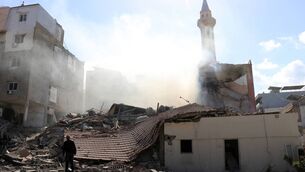 <p>A man checks the damage at the site of an Israeli airstrike that targeted a neighbourhood in the southern Lebanese coastal city of Tyre on April 9. Picture: Kawnat Haju/AFP/Getty</p>