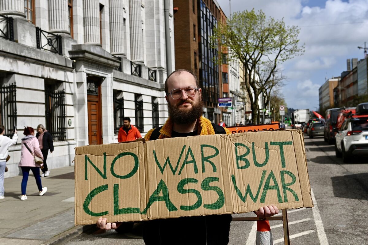  Fionn Kelleher supporting the slow protest as it passes the South Mall in Cork on Sunday. Picture: Noel Sweeney