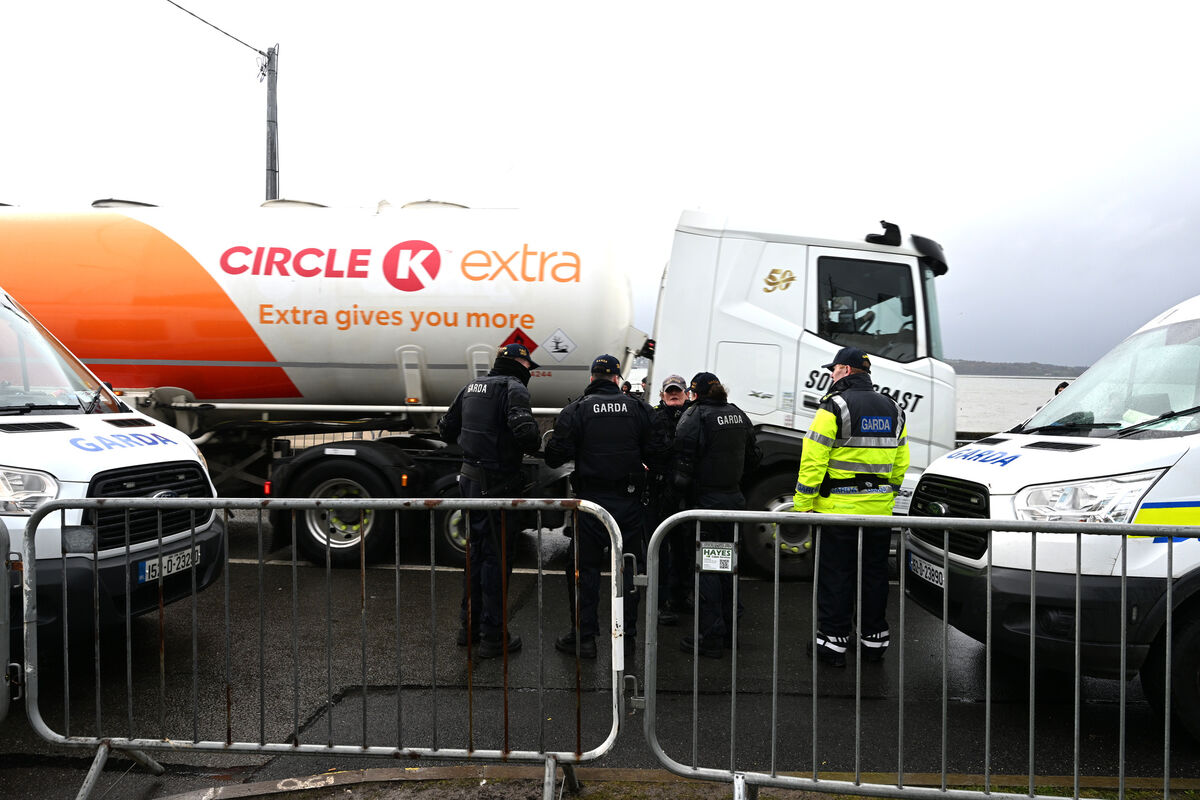 Fuel trucks departing the oil refinery under garda escort at Whitegate village on Saturday afternoon. Picture: Larry Cummins Fuel trucks departing the oil refinery under garda escort at Whitegate village on Saturday afternoon. Picture: Larry Cummins