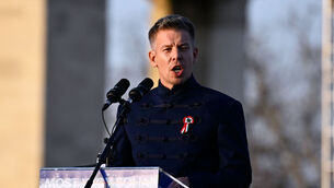 <p>Hungary's new leader Peter Magyar addresses his supporters during a march in Budapest, Sunday, March 15, 2026. (AP Photo/Denes Erdos)</p>