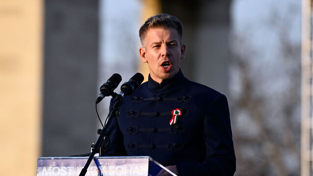 <p>Hungary's new leader Peter Magyar addresses his supporters during a march in Budapest, Sunday, March 15, 2026. (AP Photo/Denes Erdos)</p>