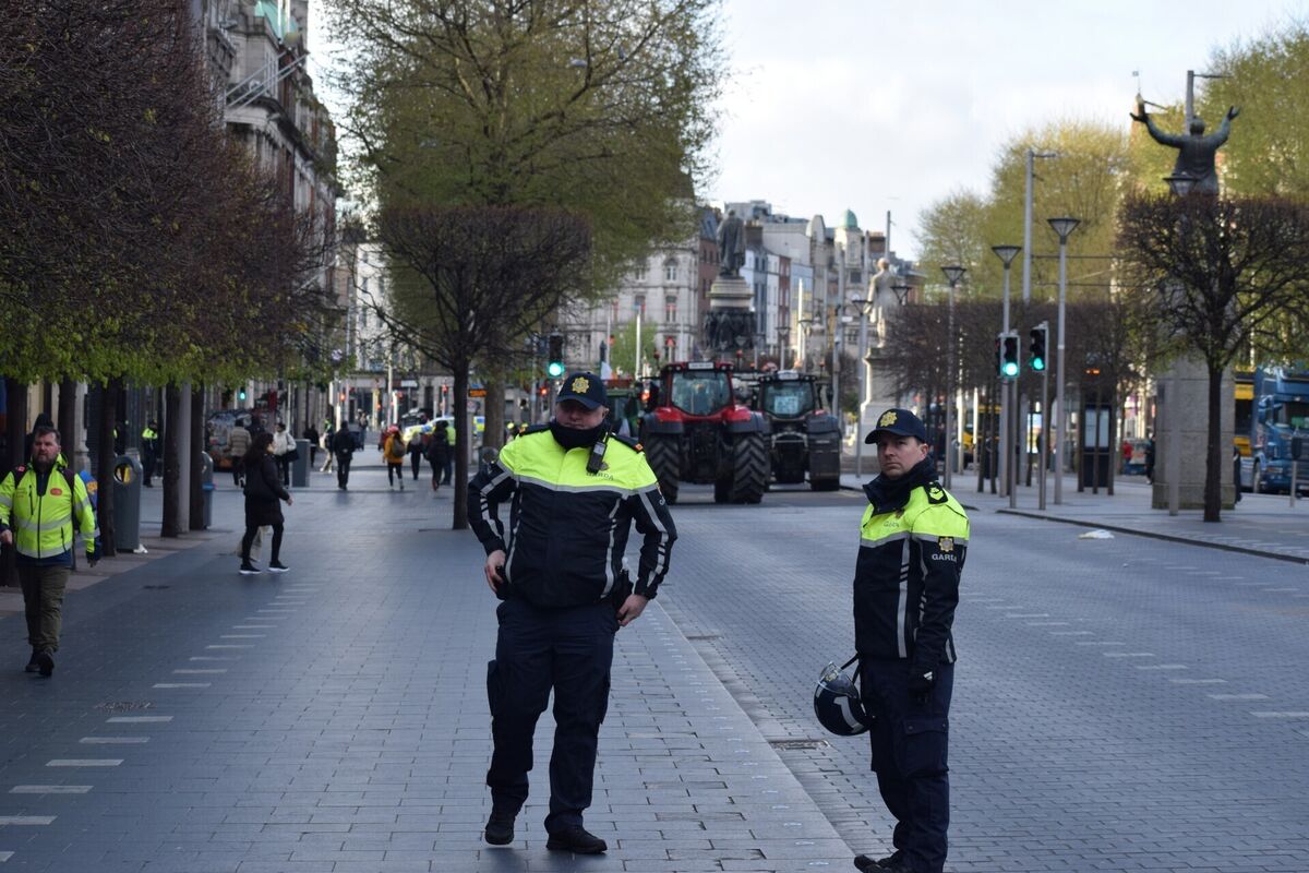 Garda on O'Connell Street in Dublin following an overnight police operation to remove fuel protesters who have been blockading the street since Tuesday. Picture: Cillian Sherlock/PA Wire