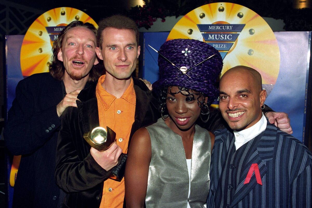 Mike Pickering with the other members of M-People