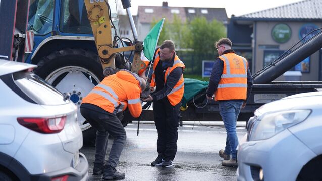 <p>Fuel protesters block the N7 motorway in Rathcoole near Dublin on the sixth day of a National Fuel Protest against rising fuel prices. Picture: Niall Carson/PA Wire</p>