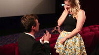 WATCH: Guy pulls off epic cinema proposal to childhood sweetheart