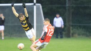 <p>Avondhu's Seamus O'Callaghan tries to block a shot at goal from Beara's James Harrington. Pic: David Creedon.</p>