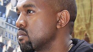 <p>Kanye West has postponed an upcoming show in France (PA)</p>