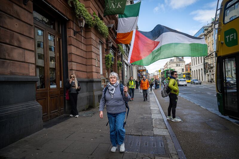 Protesters accompany 91-year-old peace activist Lelia Doolan on the final leg of her walk from Shannon to Dublin. Picture: Chani Anderson