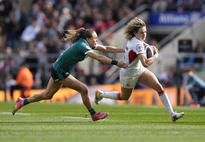 England's Ellie Kildunne and Ireland's Beibhinn Parsons in action. Pic: Andrew Matthews/PA Wire.