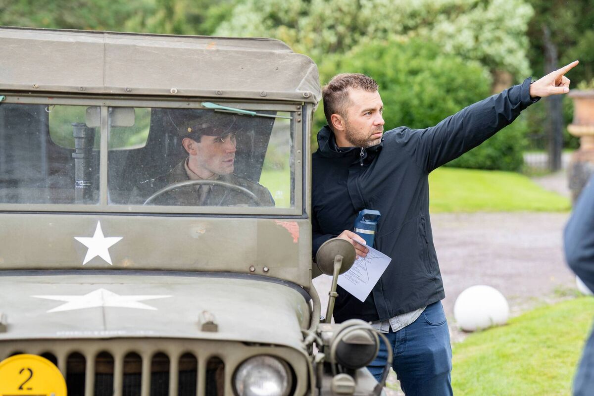 KJ Apa on the set of Jimmy with producer and director Aaron Burns. Picture: Andrew McPherson