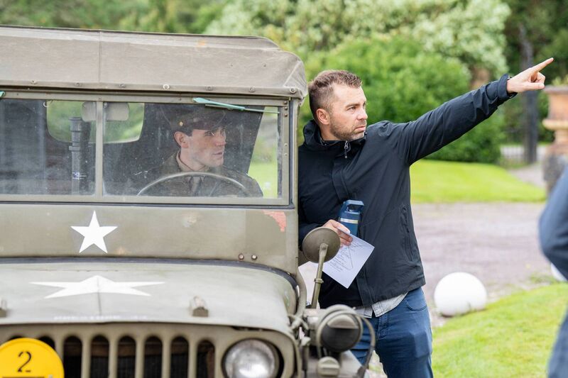 KJ Apa on the set of Jimmy with producer and director Aaron Burns. Picture: Andrew McPherson