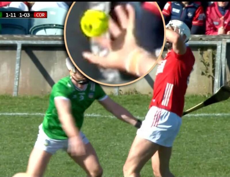 Tim O'Mahony of Cork completing a handpass against Limerick. Tim O'Mahony of Cork completing a handpass against Limerick.