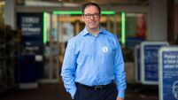 Tesco CEO Ken Murphy poses for a portrait outside a Tesco store in Britain