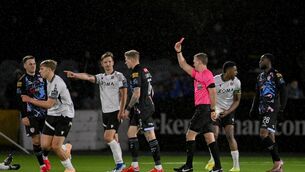 <p>UNAVAILABLE: Referee Paul Norton gives James McClean of Derry City a red card against Dundalk last week. Picture: Paul Phelan/Sportsfile</p>