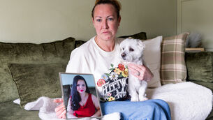 <p>Siobhán Gifford Lynch with Grace's dog Charlie at her home in Finglas, Dublin. Pictures: Gareth Chaney</p>