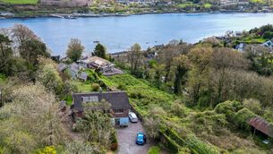 <p>An aerial view of the front of ‘Bellevue’ in Glenbrook, Passage West, showing the expansive site and elevated setting overlooking Cork Harbour. Pictures Chani Anderson</p>