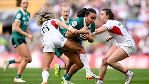 <p>Nancy McGillivray of Ireland in action against Ellie Kildunne of England. Pic: Shauna Clinton/Sportsfile</p>