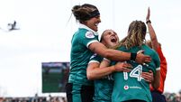Béibhinn Parsons celebrates with Erin King and Emily Lane after scoring her sides fifth try of the match 18/4/2026