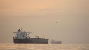 Tankers anchored in the Strait of Hormuz off the coast of Qeshm Island (Asghar Besharati/AP)