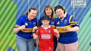 <p>Cork supporter, Evan Burgess, aged 8, from Conna, Co Cork, with my mother Niamh, left, granny Collette Ryan, from Loughmore, Co Tipperary, and aunt Tara Ryan, ahead of the Munster GAA Senior Hurling Championship Round 1 match between Tipperary and Cork at FBD Semple Stadium in Thurles, Tipperary. Photo by Daire Brennan/Sportsfile</p>