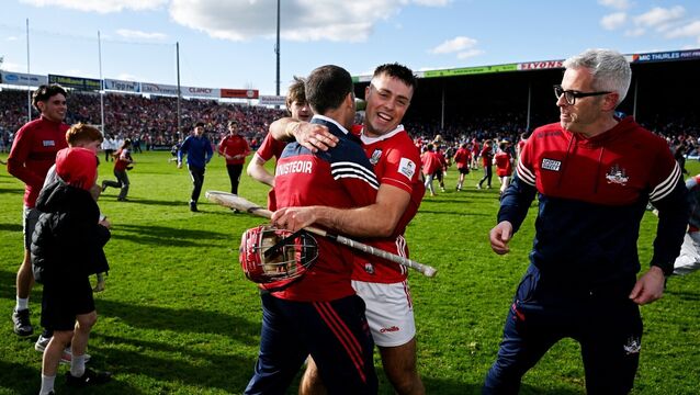 <p>William Buckley of Cork is congratulated by manager Ben O'Connor. Pic: Brendan Moran/Sportsfile</p>
