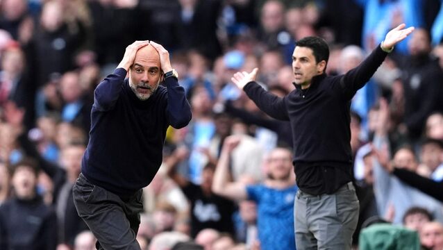 <p>TITLE PRESSURE: Manchester City manager Pep Guardiola and Arsenal manager Mikel Arteta react on the touchline. Pic: Martin Rickett/PA Wire.</p>