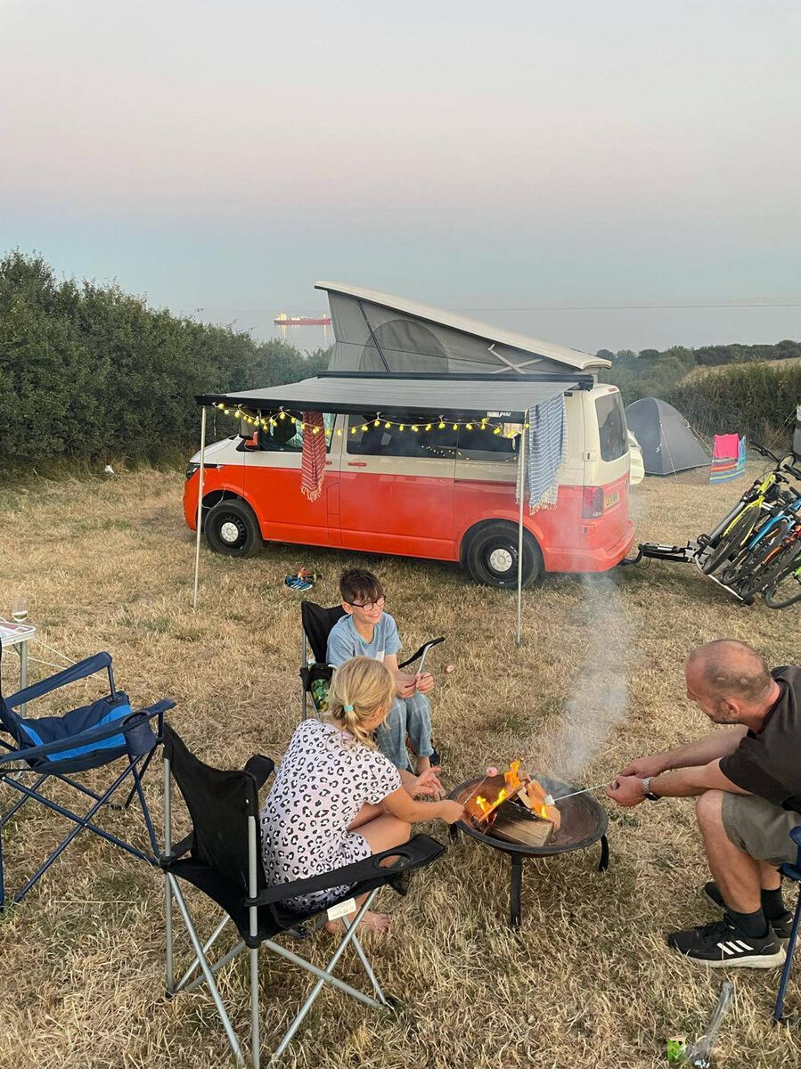 Emma Finnigan and her family enjoy time out as they cook.