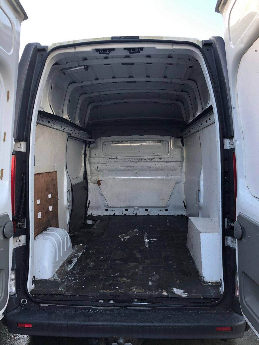 Before the conversion: Niamh Donoghue's dad helped with the project. They installed flooring and she painted the entire van white. She outsourced window installation and electrical work, for safety and practicality.