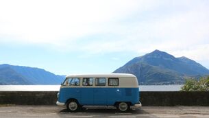 <p>Martha Timlin arrives at Italy's Lake Como in her blue vintage VW campervan.</p>