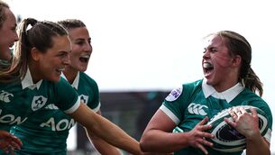 <p>Ireland's Robyn O’Connor celebrates with Aoife Dalton, Béibhinn Parsons and Emily Lane after she scores a try against Italy. Pic: ©INPHO/Dan Sheridan</p>