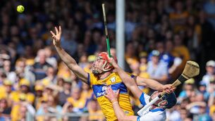 <p>LET IT IN: Peter Duggan of Clare in action against Aaron O'Neill of Waterford Pic: ©INPHO/Natasha Barton</p>