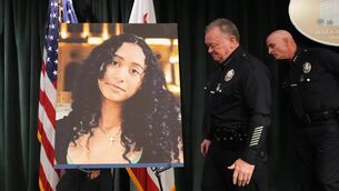 <p>LAPD Chief Jim McDonnell displays an image of Celeste Rivas Hernandez after a press conference in Los Angeles on Monday. Picture: Damian Dovarganes/AP</p>