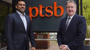 <p>Sat Shah, deputy chief executive of Bawag Group, with Eamonn Crowley, chief executive of PTSB. Picture: Chris Bellew/Fennell</p>