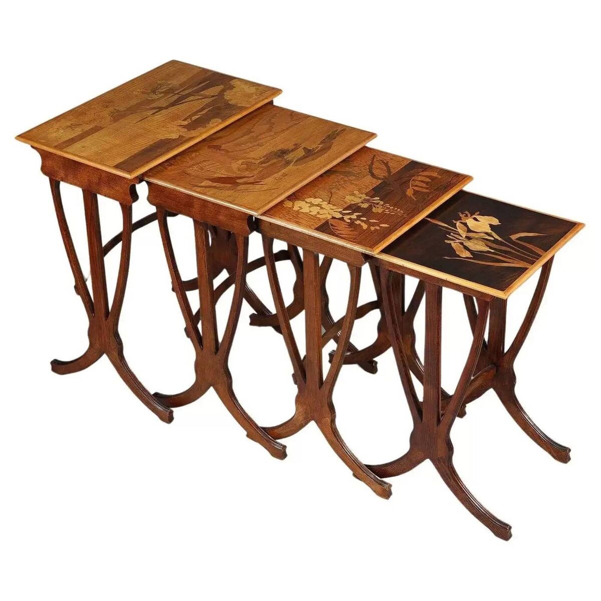 Set of four marquetry nesting tables, 1890s, signed Gallé, around €7000, 1stDibs. In different woods, they're decorated with iris, wisteria, a frog on a waterlily and umbellifers. Set of four marquetry nesting tables, 1890s, signed Gallé, around €7000, 1stDibs. In different woods, they're decorated with iris, wisteria, a frog on a waterlily and umbellifers.