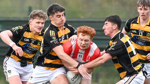 <p>Imokilly's Diarmaid Phelan is tackled by Avondhu's David Lardner. Pic: David Keane</p>