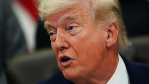 <p>Donald Trump speaks in the Oval Office of the White House (Julia Demaree Nikhinson/AP)</p>