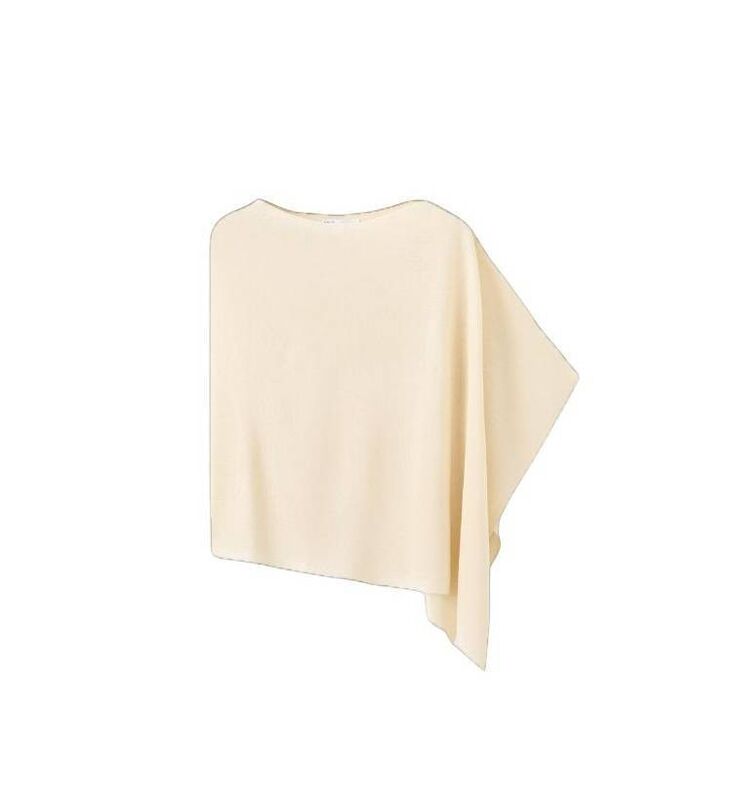 Asymmetrical Knitted Cape, €29.99, Mango.