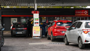 <p>Customers return to the pumps at the Circle K service station in Blackpool. Picture : Noel Sweeney</p>