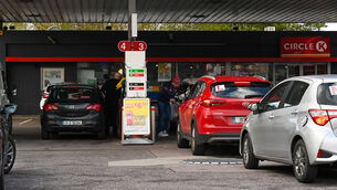 <p>Customers return to the pumps at the Circle K service station in Blackpool. Picture : Noel Sweeney</p>